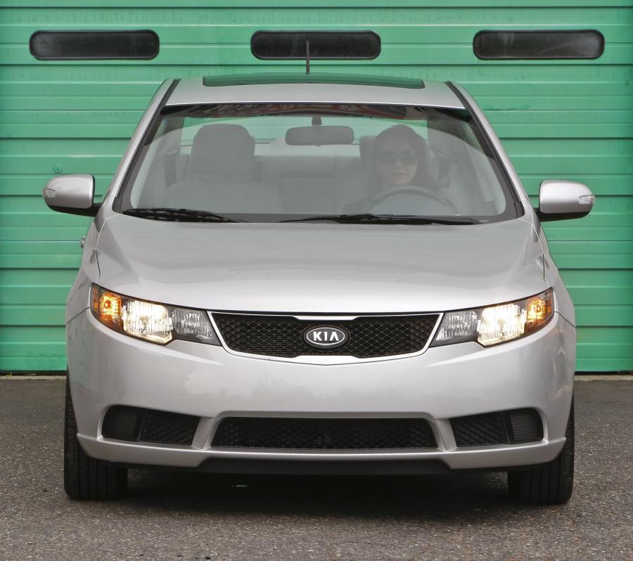  Kia Forte 2009 года  (фото 89 из 128)